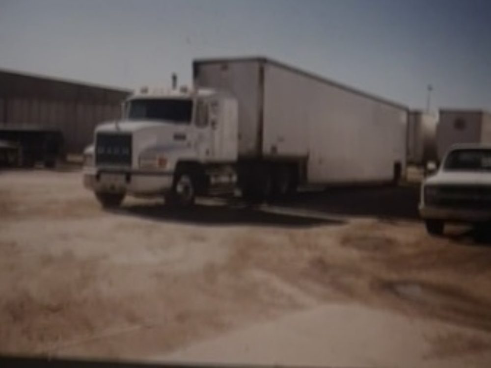 Edwards white Mack tractor with a dry van trailer, 1980s-90s