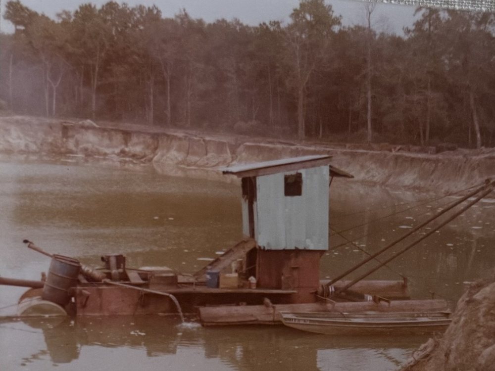 Sand dredge working a Houston-area aggregate pit in the early Edwards years